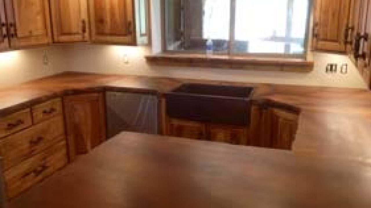 Orange And Brown Stained Concrete Kitchen Counters